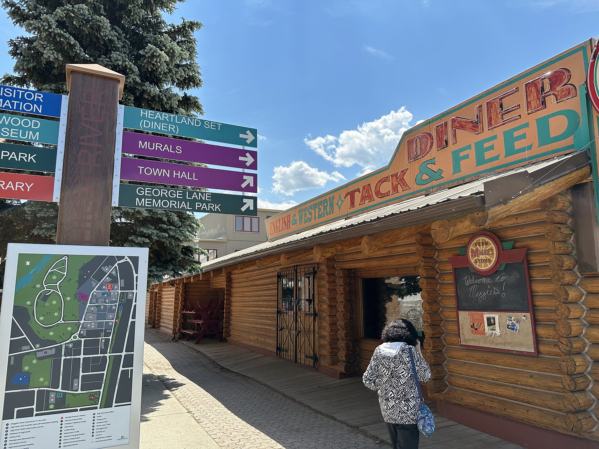Maggie's Diner and direction signs in downtown High River