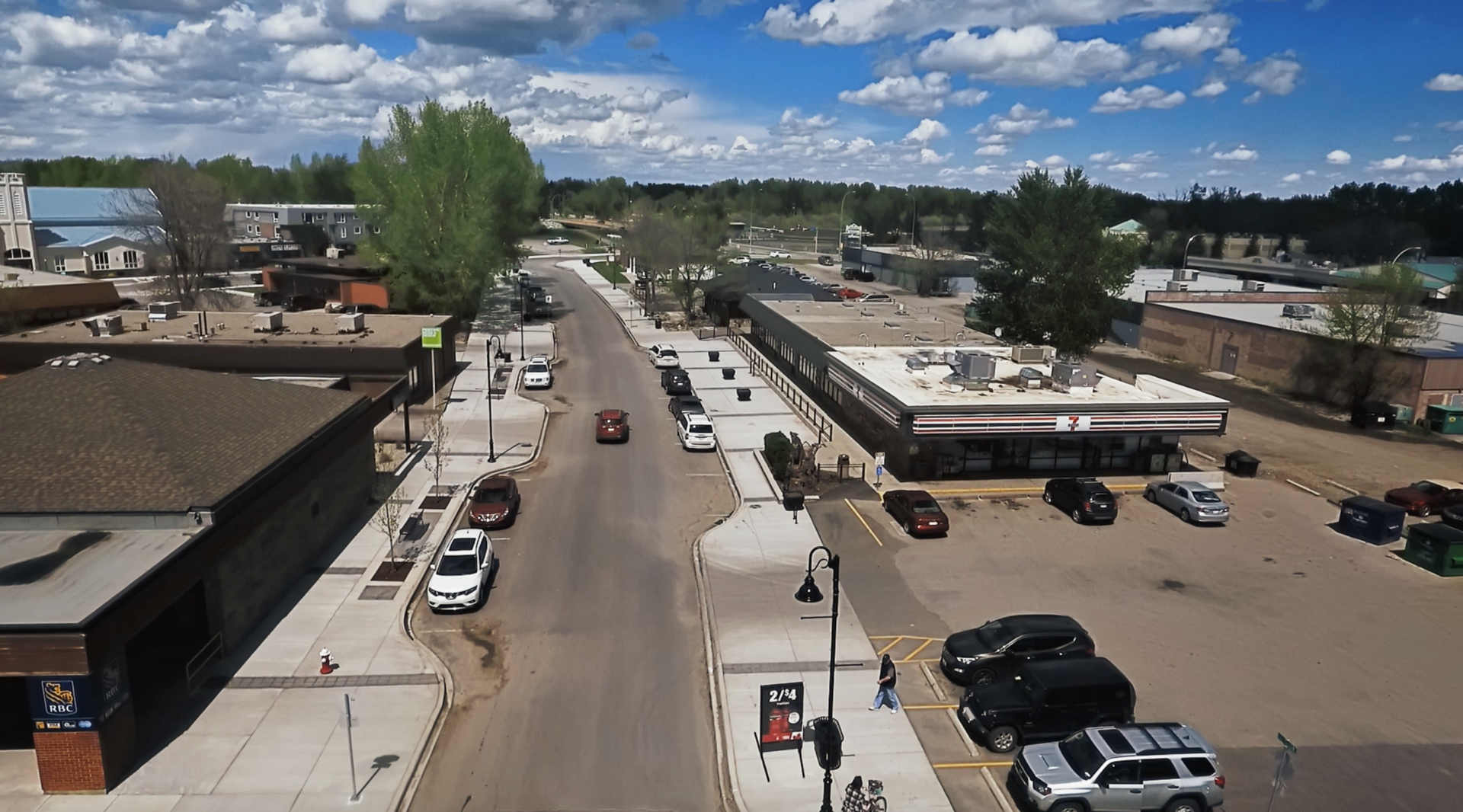 Aerial view of High River with the Rocky Mountains on the horizon